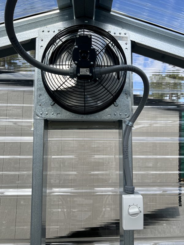 12-Ventilation-Fan-with-Thermostat-600×800 Ventilation fan with thermostat installed in a portable building, showcasing customization options for enhanced climate control.