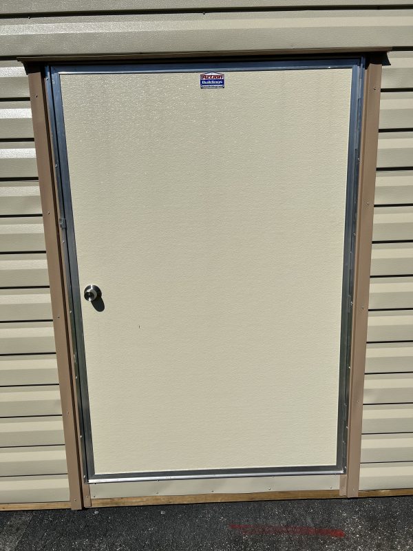 46×72-Single-Door-600×800 Portable storage building door with a smooth beige surface, metal frame, and knob, showcasing customization options for Repo Lot's portable buildings and sheds.