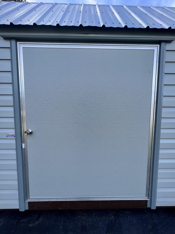 60×72-Single-Door-600×800 Single gray door of a portable storage building with metal frame and trim, showcasing customizable features for storage solutions by Repo Lot.