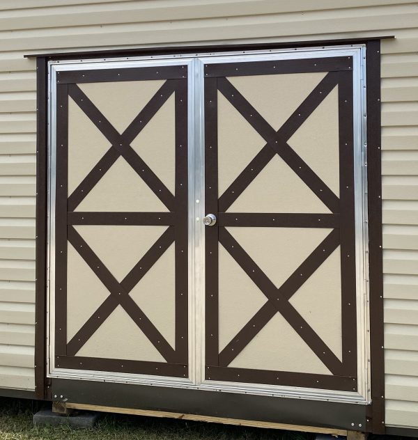 72×72-Double-Door-XBrace-600×632 Double door with X-brace design on a portable storage building, featuring a beige and brown color scheme, showcasing customization options for sheds by Repo Lot.